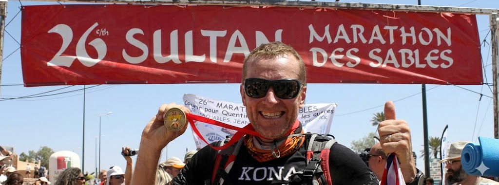 Glenn Dobson at the Ironman finish line